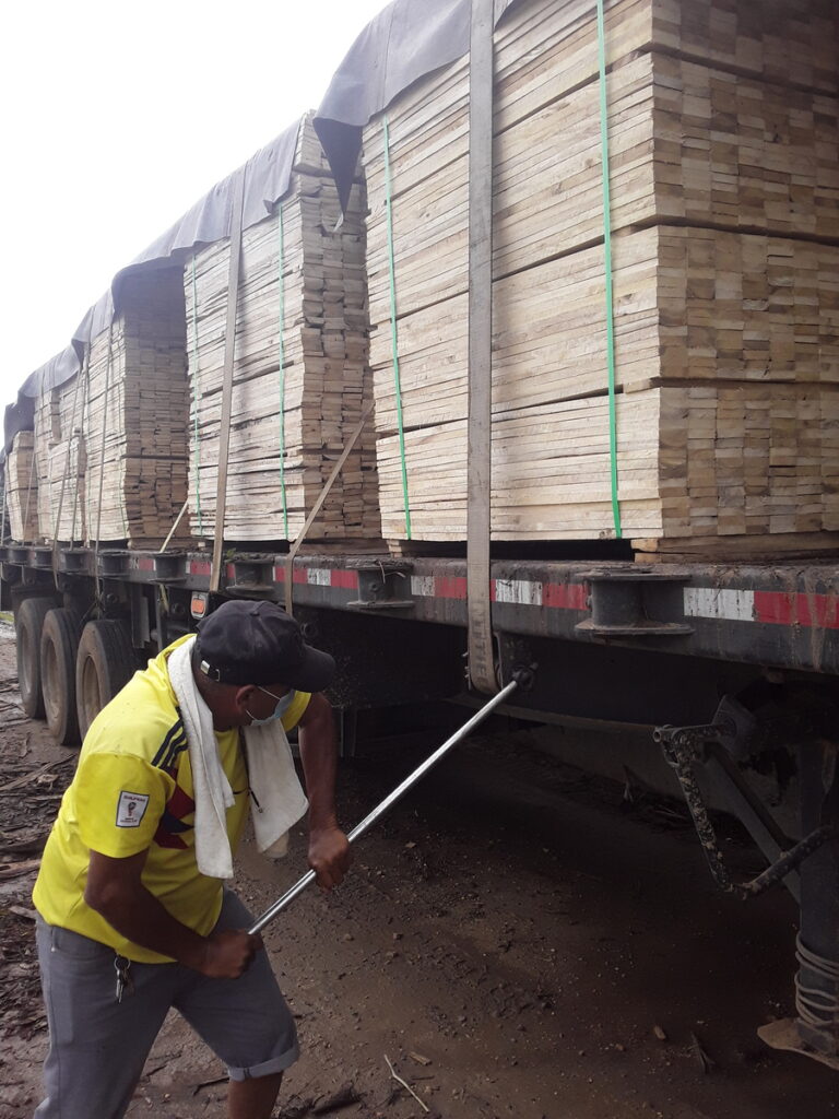 load securing piles of dimensional lumber on a truck